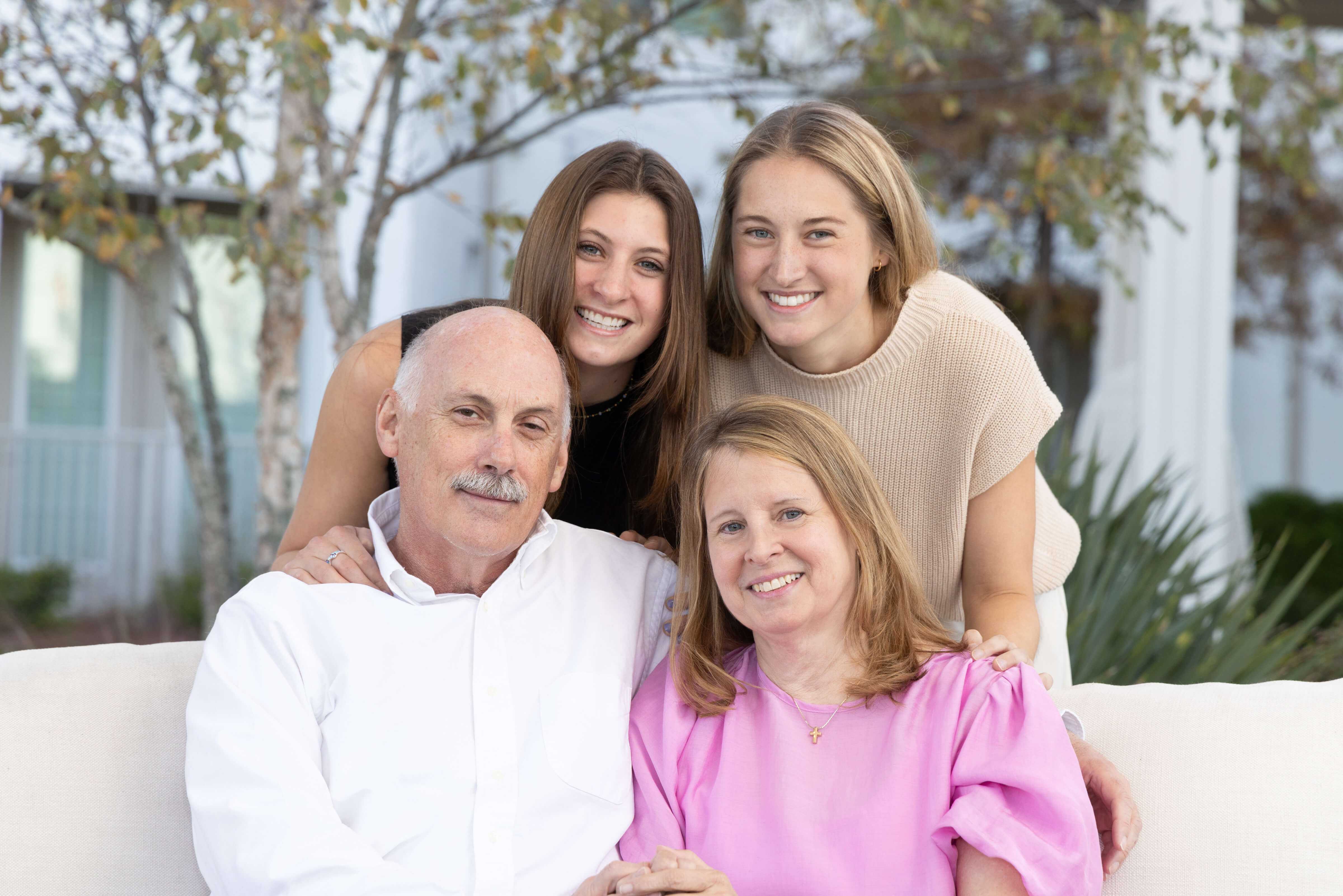 Brian Fouty, M.D., and Christine Fouty, M.D., with daughters Carolene, top left, and Anna, top right.