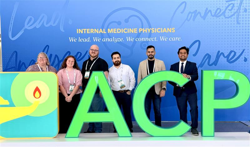 Physicians pose at ACP conference