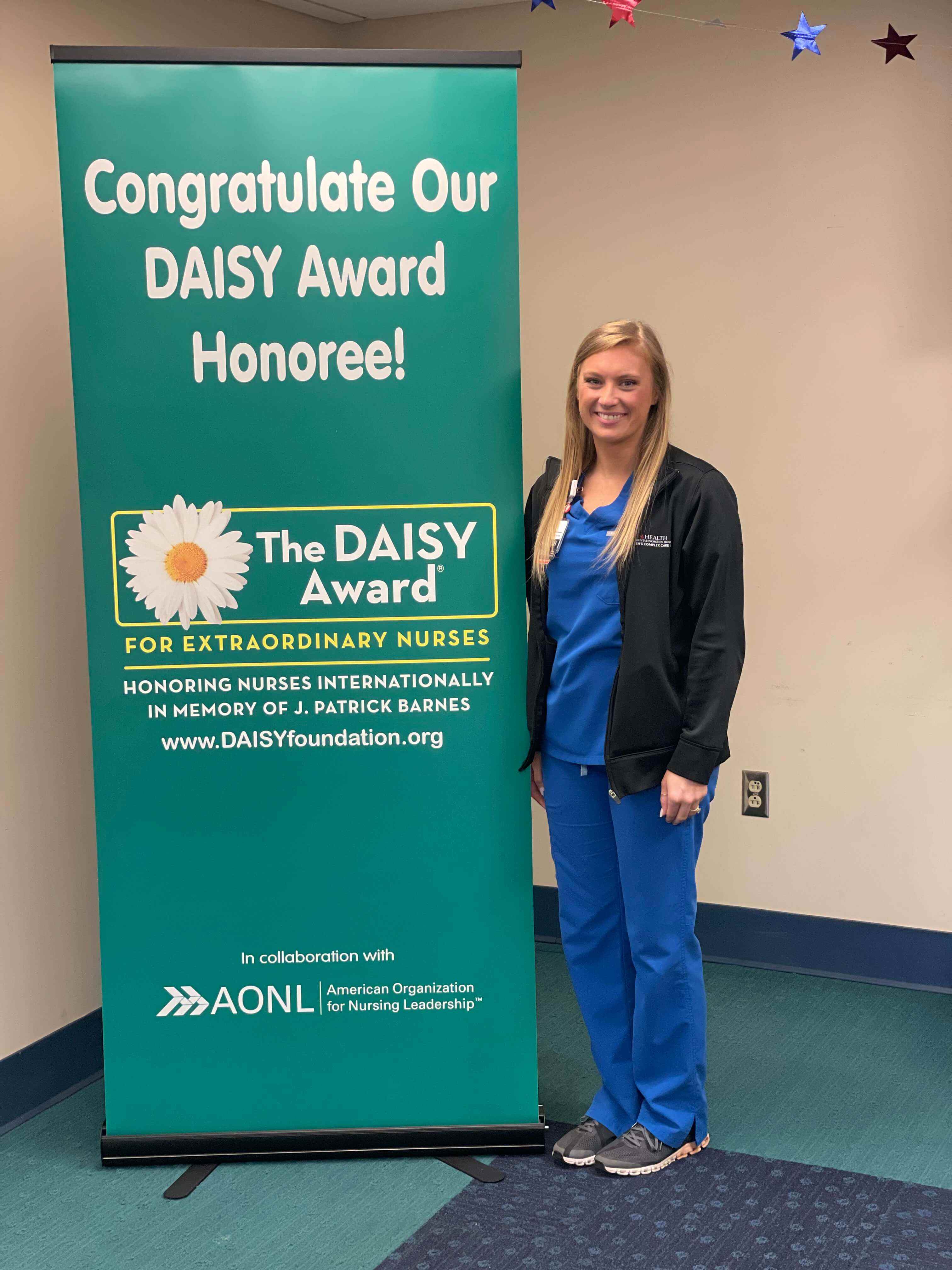 Krysta Lyon, R.N., a nurse in the women’s complex care unit, won a DAISY Award.