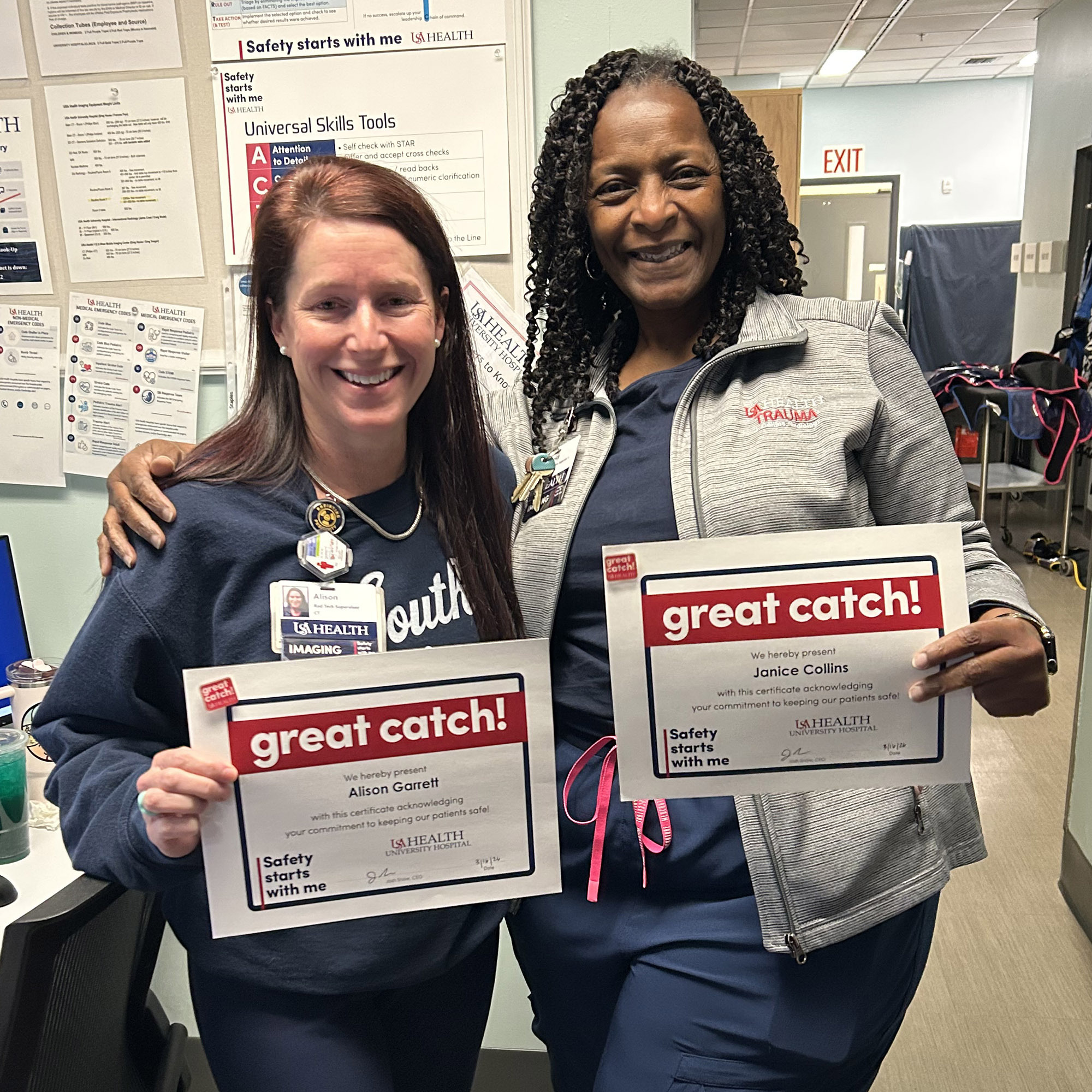 Alison Garrett, radiology tech supervisor, and Janice Collins, care access supervisor in radiology, hold their Great Catch awards.