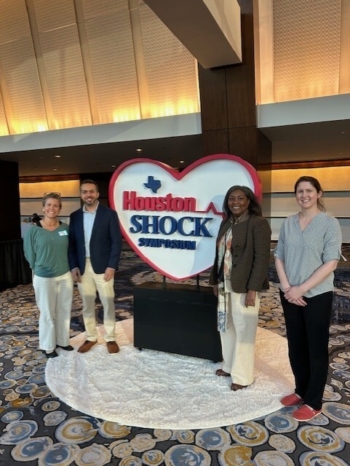 Members of a multidisciplinary team from USA Health pose together at the Houston Shock Symposium.