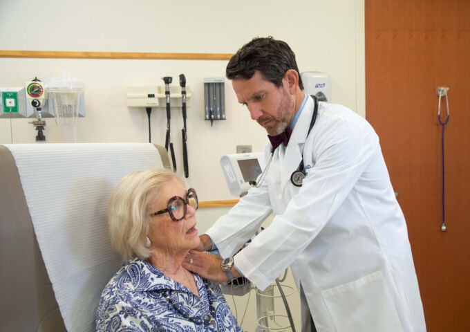 Dr. Joseph Jones examines patient