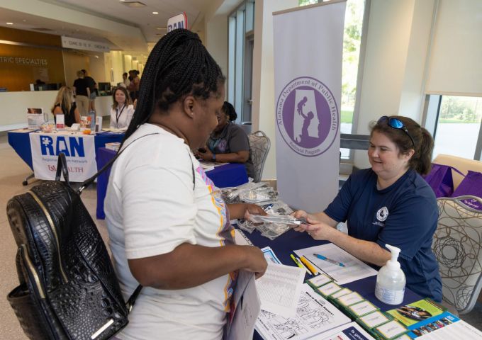 USA Health distributes more than 100 gun locks during safety fair