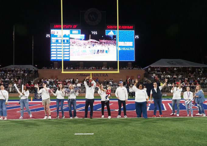 Employees celebrate USA Health Game Day 2025