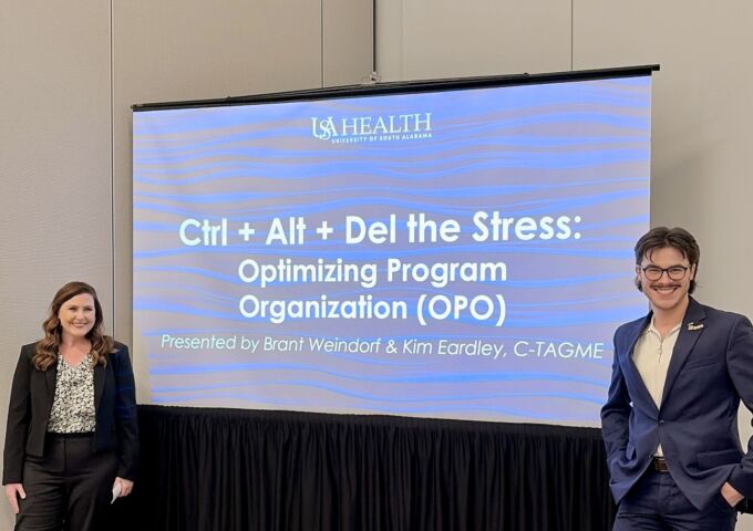 Internal medicine GME coordinators share optimization strategies at national conference - speakers standing in front of screen