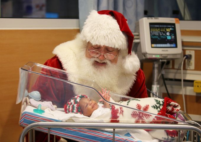 Families celebrate holidays with Santa photos in neonatal intensive care unit