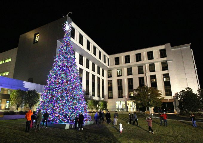 Hospital tree lighting ceremony adding staff and patient karaoke and caroling