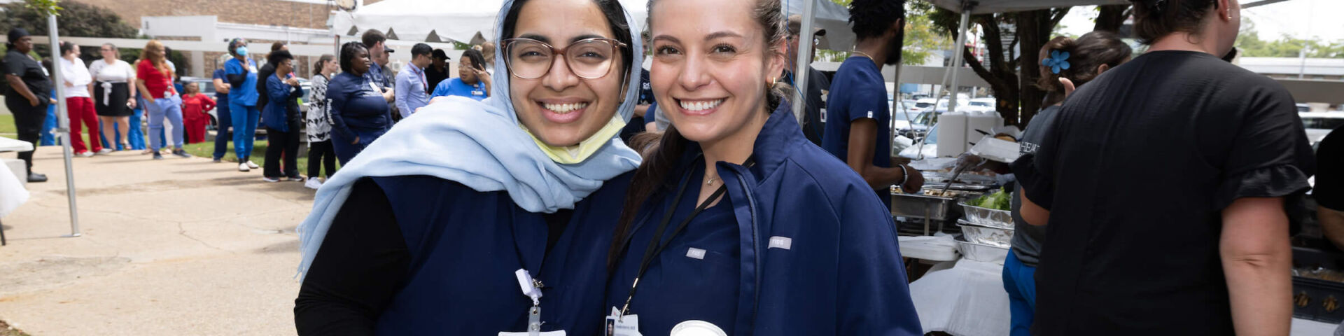 Employees pose at lunch