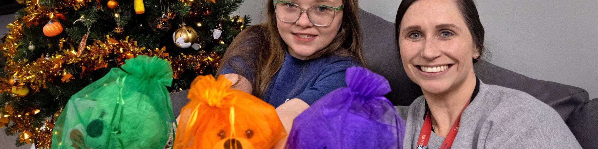 Young patient donates special-edition Higgy Bears to USA Health Complex Pediatric Spine Team for children with scoliosis