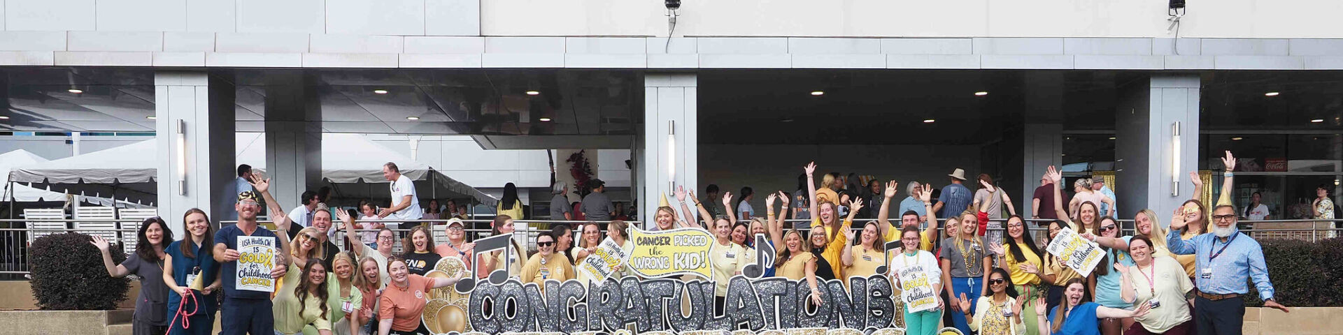 Children’s & Women’s Hospital marks Childhood Cancer Awareness Month with group photo at bell ringing ceremony
