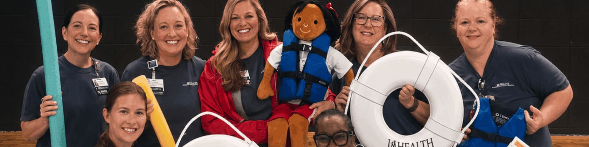 in-person water safety outreach event group photo