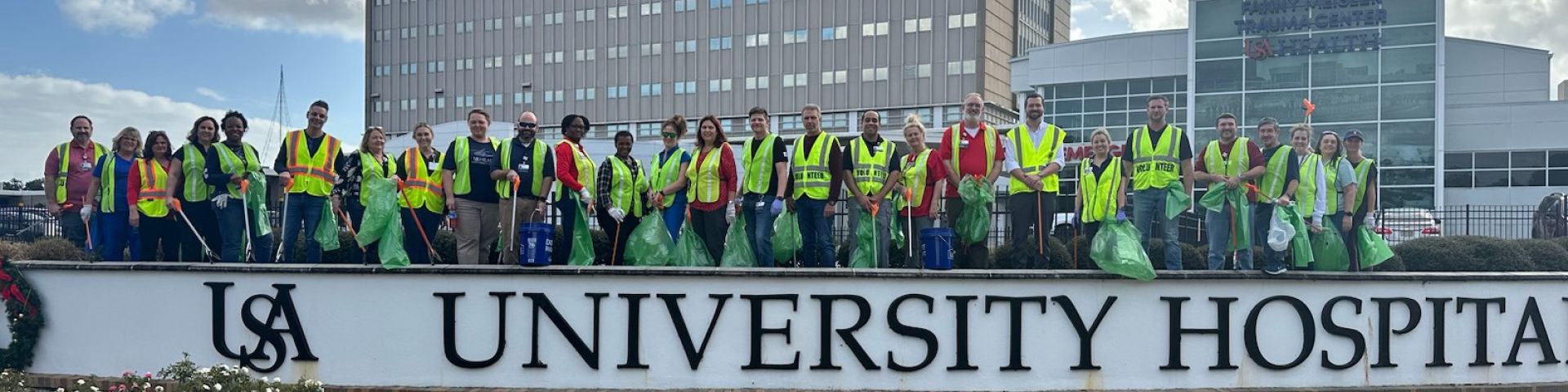 University Hospital leaders participate in cleanup project