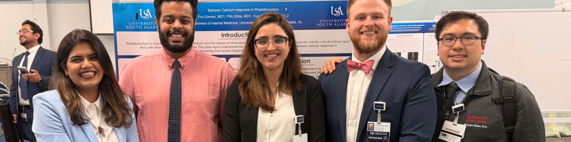 From left to right standing next to each other at symposium: Khubchandani Sidahmed Wadhwani Shiver Boeur 1