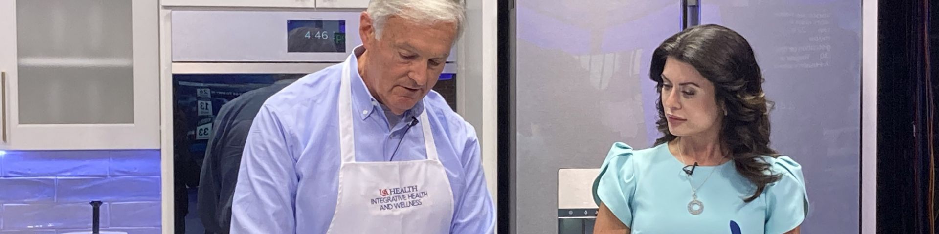 Robert Israel, M.D., demonstrates cooking a healthy recipe on WKRG.